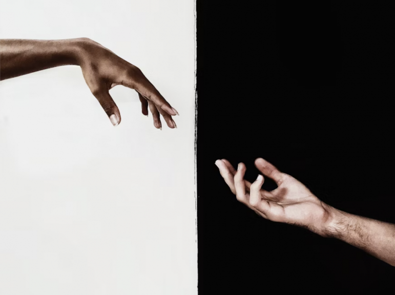 Hands reaching for each other suicide prevention hotline 988